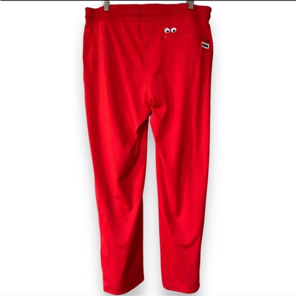 J Balvin Guess a tract pants from the capsule collection.